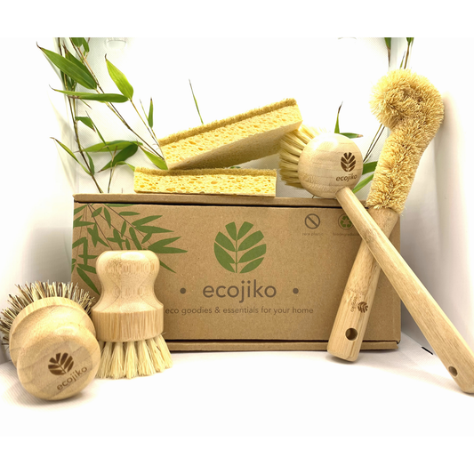 Ecojiko Zero Waste Kitchen Cleaning Kit with wooden brushes and natural sponges in a cardboard box